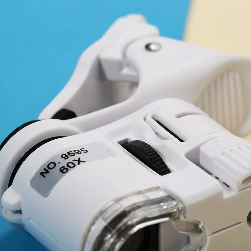 Universal Clip Microscope 60X LED Jewelry Magnifying Glass Focusing Adjusted Pocket Microscope with Cell Phone Clip UV Light